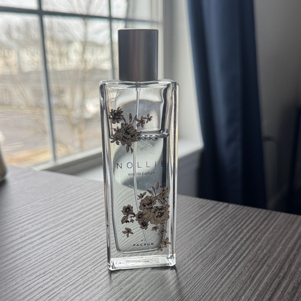 Nollie Eau de Parfum with Silver Cap and Floral Accents